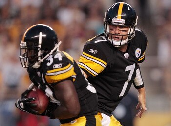 PITTSBURGH - AUGUST 18:  Ben Roethlisberger #7 of the Pittsburgh Steelers hands the ball off to teammate Rashard Mendenhall #34 during the preseason game against the Philadelphia Eagles on August 18, 2011 at Heinz Field in Pittsburgh, Pennsylvania.  (Phot