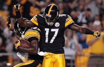 PITTSBURGH - AUGUST 18:  Antonio Brown #84 and Mike Wallace #17 of the Pittsburgh Steelers celebrate after Brown's touchdown against the Philadelphia Eagles during the preseason game on August 18, 2011 at Heinz Field in Pittsburgh, Pennsylvania.  (Photo b
