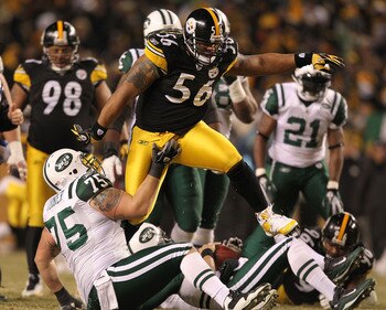 PITTSBURGH, PA - JANUARY 23:  LaMarr Woodley #56 of the Pittsburgh Steelers jumps over Robert Turner #75 of the New York Jets after a sack during the 2011 AFC Championship game at Heinz Field on January 23, 2011 in Pittsburgh, Pennsylvania.  (Photo by Al