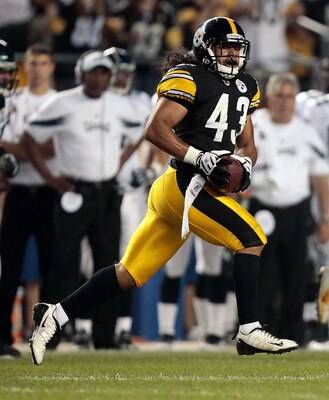 PITTSBURGH - AUGUST 18:  Troy Polamalu #43 of the Pittsburgh Steelers runs with an intercepted pass against the Philadelphia Eagles during the preseason game on August 18, 2011 at Heinz Field in Pittsburgh, Pennsylvania.  (Photo by Jared Wickerham/Getty I