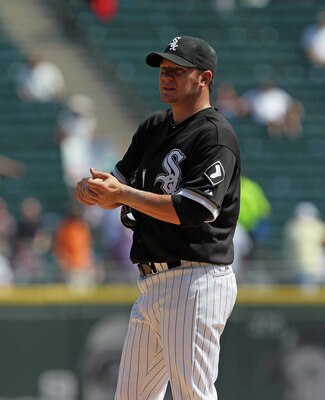 CHICAGO, IL - AUGUST 31: Jake Peavy #44 of the Chicago White Sox reacts after giving up a home run to the Minnesota Twins at U.S. Cellular Field on August 31, 2011 in Chicago, Illinois. The Twins defeated the White Sox 7-6. (Photo by Jonathan Daniel/Getty