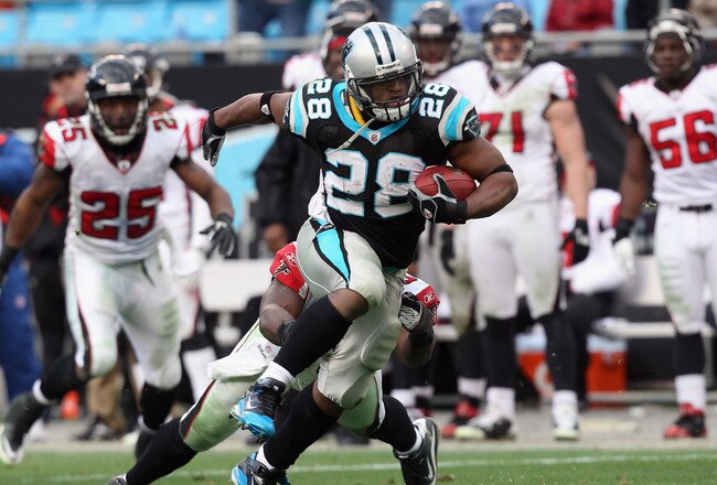 CHARLOTTE, NC - DECEMBER 12:  Jonathan Stewart #28 of the Carolina Panthers runs with the ball against the Atlanta Falcons during their game at Bank of America Stadium on December 12, 2010 in Charlotte, North Carolina.  (Photo by Streeter Lecka/Getty Imag