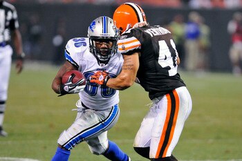 CLEVELAND, OH - AUGUST 19: Jerome Harrison #36 of the Detroit Lions rushes for a first down against Raymond Ventrone #41 of the Cleveland Browns during the third quarter at Cleveland Browns Stadium on August 19, 2011 in Cleveland, Ohio. The Tigers defeate