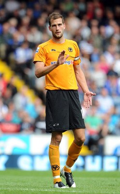 BLACKBURN, ENGLAND - AUGUST 13:  Roger Johnson of Wolverhampton Wanderers gestures during the Barclays Premier League match between Blackburn Rovers and Wolverhampton Wanderers at Ewood Park on August 13, 2011 in Blackburn, England.  (Photo by Chris Bruns