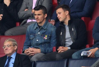 WIGAN, ENGLAND - AUGUST 27:  Joey Barton the new signing of Queens Park Rangers watches from the stands during the Barclays Premier League match between Wigan Athletic and Queens Park Rangers at the DW Stadium on August 27, 2011 in Wigan, England.  (Photo