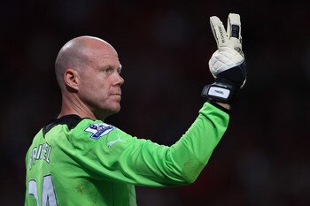 MANCHESTER, ENGLAND - AUGUST 22:  Brad Friedel of Tottenham Hotspur directs his defence during the Barclays Premier League match between Manchester United and Tottenham Hotspur at Old Trafford on August 22, 2011 in Manchester, England.  (Photo by Alex Liv