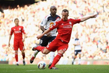 LIVERPOOL, ENGLAND - AUGUST 27:  Charlie Adam of Liverpool shoots and scores his side's third goal during the Barclays Premier League match between Liverpool and Bolton Wanderers at Anfield on August 27, 2011 in Liverpool, England.  (Photo by Clive Brunsk