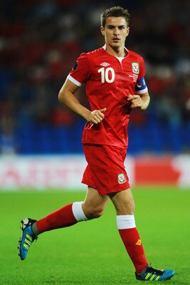CARDIFF, WALES - SEPTEMBER 02:  Aaron Ramsey of Wales in action during the UEFA EURO 2012 group G qualifying match between Wales and Montenegro at the Cardiff City Stadium on September 2, 2011 in Cardiff, Wales.  (Photo by Paul Gilham/Getty Images)