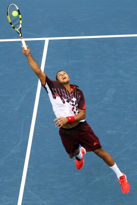 NEW YORK, NY - SEPTEMBER 01:  Jo-Wilfried Tsonga of France returns a shot against Sergei Bubka of Ukraine during Day Four of the 2011 US Open at the USTA Billie Jean King National Tennis Center on September 1, 2011 in the Flushing neighborhood of the Quee