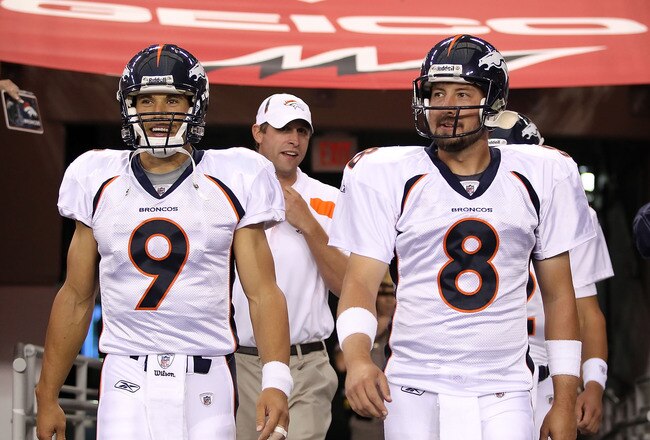 GLENDALE, AZ - SEPTEMBER 01:  Quarterbacks Brady Quinn #9 and Kyle Orton #8 of the Denver Broncos walk out onto the field for warm ups to the preseason NFL game against the Arizona Cardinals at the University of Phoenix Stadium on September 1, 2011 in Gle