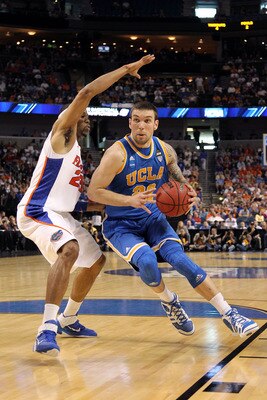 TAMPA, FL - MARCH 19:  Reeves Nelson #22 of the UCLA Bruins drives against Alex Tyus #23 of the Florida Gators during the third round of the 2011 NCAA men's basketball tournament at St. Pete Times Forum on March 19, 2011 in Tampa, Florida. Florida won 73-