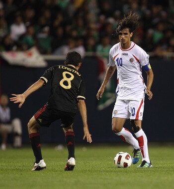 CHICAGO, IL - JUNE 12:  Bryan Ruiz #1o of Costa Rica challenges Israel Castro #8 of Mexico during a CONCACAF Gold Cup 2011 match at Soldier Field on June 12, 2011 in Chicago, Illinois. Mexico defeated Costa Rica 4-1.  (Photo by Jonathan Daniel/Getty Image