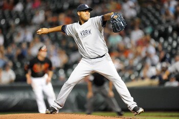 BALTIMORE, MD - AUGUST 28:  Ivan Nova #47 of the New York Yankees pitches during a baseball game against the Baltimore Orioles at Oriole Park at Camden Yards on August 28, 2011 in Baltimore, Maryland.  (Photo by Mitchell Layton/Getty Images)