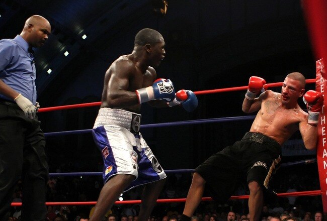 ATLANTIC CITY, NJ - SEPTEMBER 29:  David Estrada falls against the ropes after receiving a blow from Andre Berto during their NABF Welterweight Championship fight at Boardwalk Hall on September 29, 2007 in Atlantic City, New Jersey.  (Photo by Al Bello/Ge
