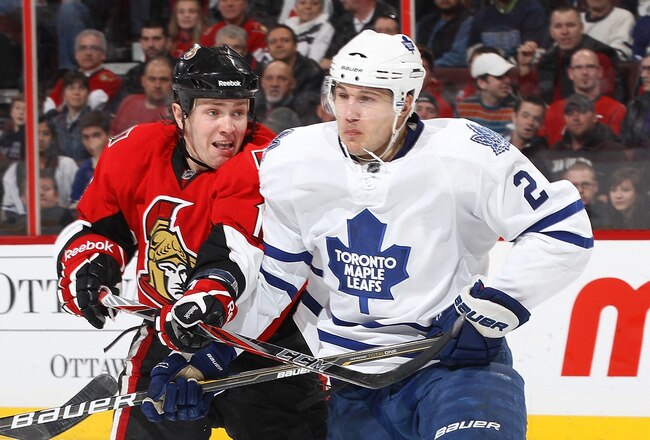 OTTAWA, CANADA - APRIL 2: Bobby Butler #16 of the Ottawa Senators battles for position against Luke Schenn #2 of the Toronto Maple Leafs at Scotiabank Place on April 2, 2011 in Ottawa, Ontario, Canada.  (Photo by Jana Chytilova/Freestyle Photography/Getty