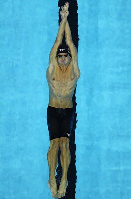 SHANGHAI, CHINA - JULY 31:  Nicholas Thoman of the United States competes in the Men's 4x100m Medley Relay during Day Sixteen of the 14th FINA World Championships at the Oriental Sports Center on July 31, 2011 in Shanghai, China.  (Photo by Quinn Rooney/G