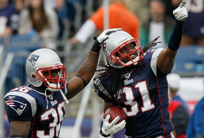 FOXBORO, MA - SEPTEMBER 26:  Brandon Meriweather  #31 of the New England Patriots reacts with teammate James Sanders #36 after Meriweather intercepted a pass against the Buffalo Bills in the second half at Gillette Stadium on September 26, 2010 in Foxboro