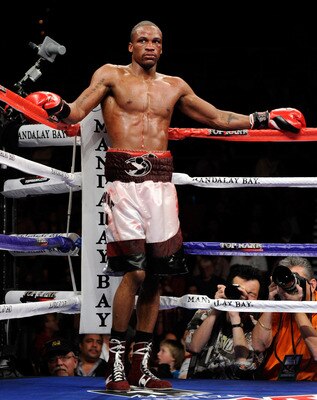 LAS VEGAS, NV - FEBRUARY 19:  Mike Jones of Philadelphia waits in a neutral corner of the ring as a doctor checks on Jesus Soto-Karass of Mexico during their welterweight bout at the Mandalay Bay Events Center February 19, 2011 in Las Vegas, Nevada. Jones
