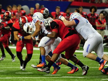 ATLANTA - SEPTEMBER 3: Doug Martin #22 of the Boise State Broncos carries the ball against the Georgia Bulldogs during the Chick-Fil-A Kickoff Game at the Georgia Dome on September 3, 2011 in Atlanta, Georgia. (Photo by Scott Cunningham/Getty Images)
