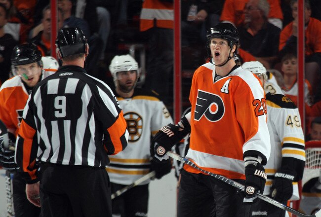 PHILADELPHIA, PA - APRIL 30: Chris Pronger #20 of the Philadelphia Flyers argues a call with referee Dan O'Rourke #9 in Game One against the Boston Bruins  of the Eastern Conference Semifinals during the 2011 NHL Stanley Cup Playoffs at the Wells Fargo Ce