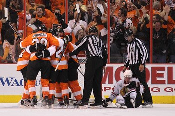 PHILADELPHIA - JUNE 09:  Chris Pronger #20 of the Philadelphia Flyers celebrates with teammates after Scott Hartnell #19 of the Flyers scored a goal in the third period against the Chicago Blackhawks in Game Six of the 2010 NHL Stanley Cup Final at the Wa