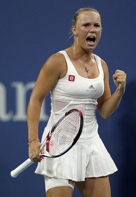 NEW YORK, NY - SEPTEMBER 05:  Caroline Wozniacki of Denmark celebrates a point against Svetlana Kuznetsova of Russia during Day Eight of the 2011 US Open at the USTA Billie Jean King National Tennis Center on September 5, 2011 in the Flushing neighborhood