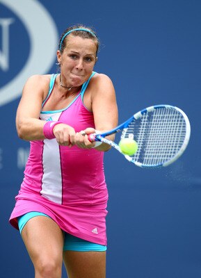 NEW YORK, NY - SEPTEMBER 05:  Anastasia Pavlyuchenkova of Russia returns a shot against  Francesca Schiavone of Italy during Day Eight of the 2011 US Open at the USTA Billie Jean King National Tennis Center on September 5, 2011 in the Flushing neighborhoo