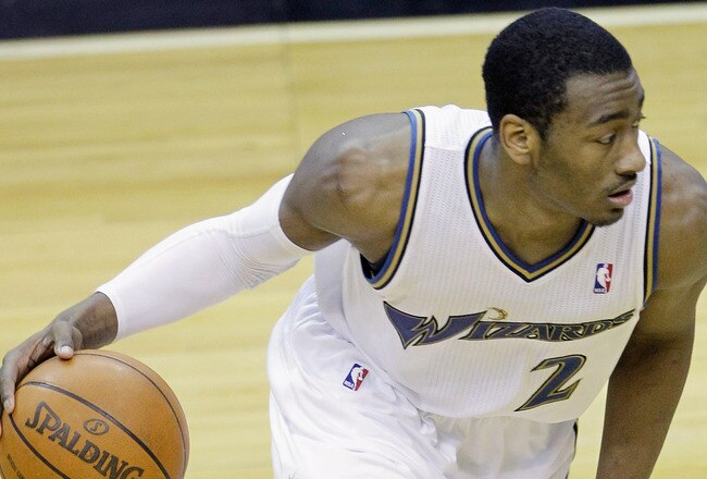 WASHINGTON, DC - MARCH 14: John Wall #2 of the Washington Wizards dribbles against the Oklahoma City Thunder during the second half at the Verizon Center on March 14, 2011 in Washington, DC. NOTE TO USER: User expressly acknowledges and agrees that, by do