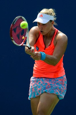 NEW YORK, NY - SEPTEMBER 04:  Angelique Kerber of Germany returns a shot Monica Niculescu of Romania aganst during Day Seven of the 2011 US Open at the USTA Billie Jean King National Tennis Center on September 4, 2011 in the Flushing neighborhood of the Q
