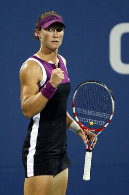 NEW YORK, NY - SEPTEMBER 02:  Samantha Stosur of Australia wipes reacts against  Nadia Petrova of Russia during Day Five of the 2011 US Open at the USTA Billie Jean King National Tennis Center on September 2, 2011 in the Flushing neighborhood of the Queen