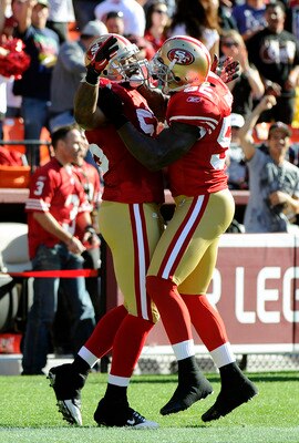 SAN FRANCISCO - AUGUST 27:  Ahmad Brooks #55 and Patrick Willis #52 of the San Francisco 49ers celebrates after Brooks runs back an interception for a touchdown against the Houston Texans in the first quarter during an NFL pre-season football game at Cand