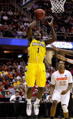 CLEVELAND, OH - MARCH 20: Darius Johnson-Odom #1 of the Marquette Golden Eagles drives to the basket against the Syracuse Orange during the third of the 2011 NCAA men's basketball tournament at Quicken Loans Arena on March 20, 2011 in Cleveland, Ohio.  (P