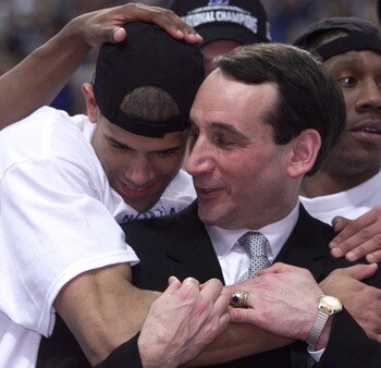 2 Apr 2001:  Head coach Mike Krzyzewski hugs his player Shane Battier #31 after defeating Arizona 82-72 in the NCAA National Championship Game of the Men's Final Four tournament at the Metrodome in Minneapolis, Minnesota.  DIGITAL IMAGE. Mandatory Credit: