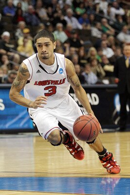 DENVER, CO - MARCH 17:  Peyton Siva #3 of the Louisville Cardinals handles the ball against the Morehead State Eagles during the second round of the 2011 NCAA men's basketball tournament at Pepsi Center on March 17, 2011 in Denver, Colorado.  (Photo by Ju