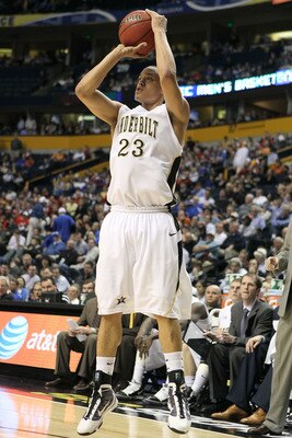 NASHVILLE, TN - MARCH 12:  John Jenkins #23 of the Vanderbilt Commodores attempts a shot against the Georgia Bulldogs during the quarterfinals of the SEC Men's Basketball Tournament at the Bridgestone Arena on March 12, 2010 in Nashville, Tennessee.  (Pho
