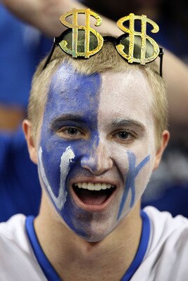 HOUSTON, TX - APRIL 02:  A Kentucky Wildcats fan cheers before the National Semifinal game of the 2011 NCAA Division I Men's Basketball Championship against the Connecticut Huskies at Reliant Stadium on April 2, 2011 in Houston, Texas.  (Photo by Andy Lyo