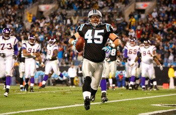 CHARLOTTE, NC - DECEMBER 20:  Brad Hoover #45 of the Carolina Panthers scores a touchdown against the Minnesota Vikings at Bank of America Stadium on December 20, 2009 in Charlotte, North Carolina.  (Photo by Kevin C. Cox/Getty Images)