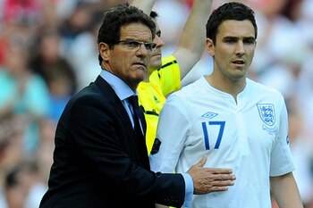 LONDON, ENGLAND - JUNE 04:  England Manager Fabio Capello sends on Stewart Downing as a substitute during the UEFA EURO 2012 group G qualifying match between England and Switzerland at Wembley Stadium on June 4, 2011 in London, England.  (Photo by Clive M