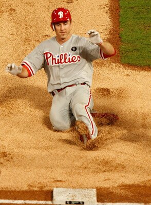 MIAMI GARDENS, FL - SEPTEMBER 03:  Chase Utley #26 of the Philadelphia Phillies heads to third on a triple during a game against the Florida Marlins at Sun Life Stadium on September 3, 2011 in Miami Gardens, Florida.  (Photo by Mike Ehrmann/Getty Images)
