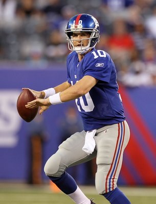 EAST RUTHERFORD, NJ - AUGUST 29:  Eli Manning #10 of the New York Giants in action against the New York Jets during their pre season game on August 29, 2011 at MetLife Stadium in East Rutherford, New Jersey.  (Photo by Jim McIsaac/Getty Images)