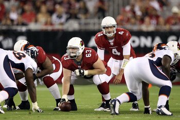 GLENDALE, AZ - SEPTEMBER 01:  Quarterback Kevin Kolb #4 of the Arizona Cardinals prepares to snap the football during the preseason NFL game against the Denver Broncos at the University of Phoenix Stadium on September 1, 2011 in Glendale, Arizona. The Car