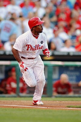 PHILADELPHIA , PA - AUGUST 17:  Jimmy Rollins #11 of the Philadelphia Phillies watches his first inning homerun leave the park against the Arizona Diamondbacks at Citizens Bank Park on August 17, 2011 in Philadelphia, Pennsylvania.  (Photo by Len Redkoles
