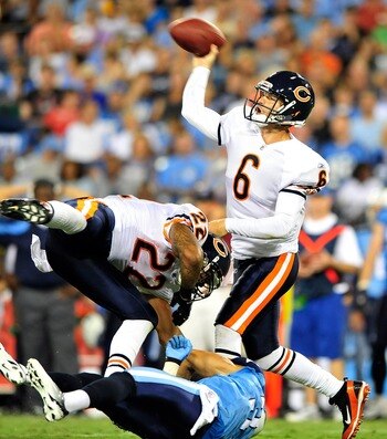 NASHVILLE, TN - AUGUST 27:  Matt Forte #22 of the Chicago Bears blocks Jason McCourty #30 of the Tennessee Titans as quarterback Jay Cutler #6 drops back to throw during a preseason game at LP Field on August 27, 2011 in Nashville, Tennessee.  (Photo by G