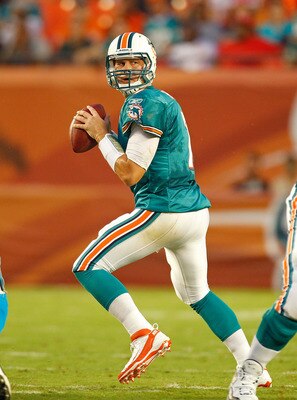 MIAMI GARDENS, FL - AUGUST 19:  Chad Henne #7 of the Miami Dolphins drops back during a preseason NFL game against the Carolina Panthers at Sun Life Stadium on August 19, 2011 in Miami Gardens, Florida.  (Photo by Mike Ehrmann/Getty Images)