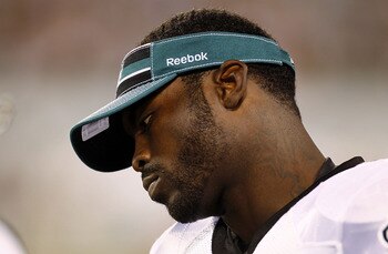 EAST RUTHERFORD, NJ - SEPTEMBER 01:   Michael Vick #7 of the Philadelphia Eagles stands on the sidelines during a pre-season game against the New York Jets at MetLife Stadium on September 1, 2011 in East Rutherford, New Jersey.  (Photo by Jeff Zelevansky/
