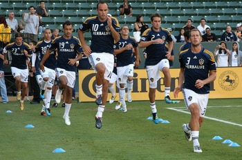 CARSON, CA - JULY 09:  Landon Donovan #10 of the Los Angeles Galaxy and teammates warm up prior to the MLS match against the Chicago Fire at The Home Depot Center on July 9, 2011 in Carson, California. The Galaxy defeated the Fire 2-1.  (Photo by Victor D