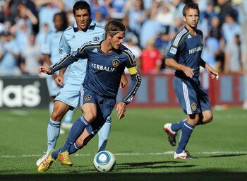 KANSAS CITY, KS - SEPTEMBER 05:  Midfielder David Beckham #23 of the Los Angeles Galaxy moves the ball up field against Sporting Kansas City during the first half on September 5, 2011 at LiveStrong Sporting Park in Kansas City, Kansas.  (Photo by Peter Ai