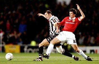 7 Apr 1999:  Zinedine Zidane of Juventus nips infront of Roy Keane of Manchester United in the UEFA Champions League semi-final first leg match at Old Trafford in Manchester, England. The game ended 1-1. \ Mandatory Credit: Shaun Botterill /Allsport