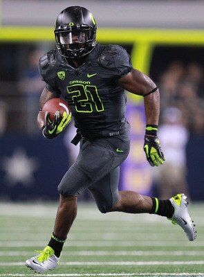 ARLINGTON, TX - SEPTEMBER 03:  LaMichael James #21 of the Oregon Ducks runs the ball against the LSU Tigers at Cowboys Stadium on September 3, 2011 in Arlington, Texas.  (Photo by Ronald Martinez/Getty Images)