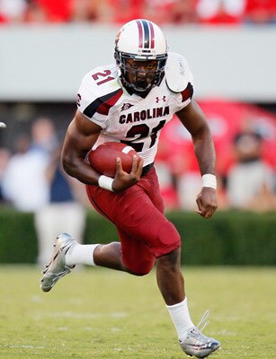 ATHENS, GA - SEPTEMBER 10:  Marcus Lattimore #21 of the South Carolina Gamecocks rushes upfield against the Georgia Bulldogs at Sanford Stadium on September 10, 2011 in Athens, Georgia.  (Photo by Kevin C. Cox/Getty Images)